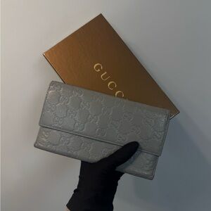 Gucci Silver Embossed Logo Wallet
